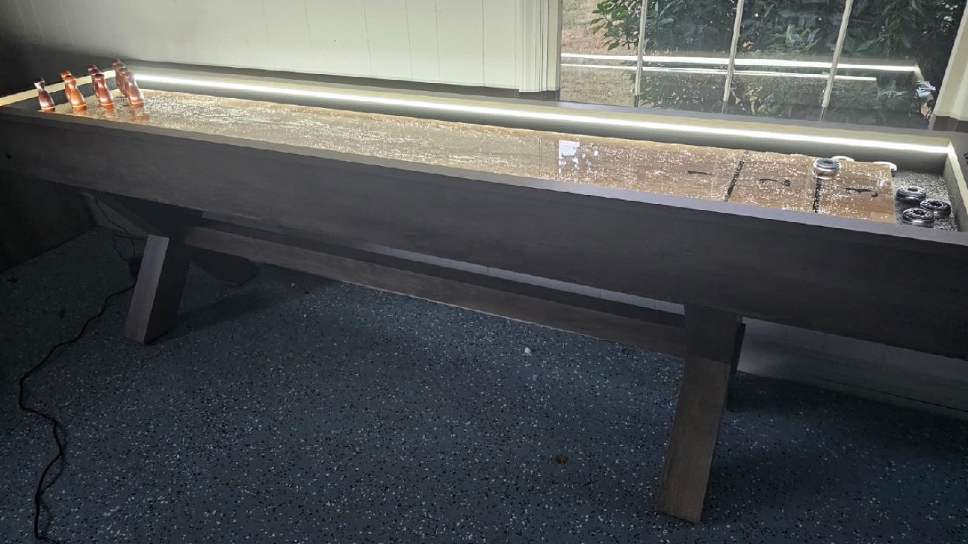 Full length shuffleboard table at Mojo's Arcade